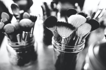 Facial skincare routine with advanced tools: facial steamers, microdermabrasion machines, targeted treatments, and sun protection